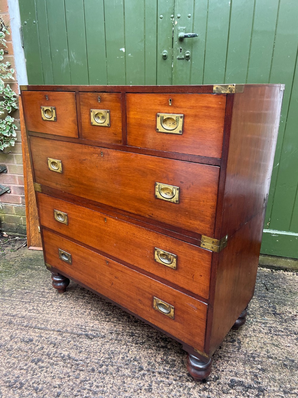 Mid C19th brass-bound mahogany military officer’s campaign chest of drawers . View XX