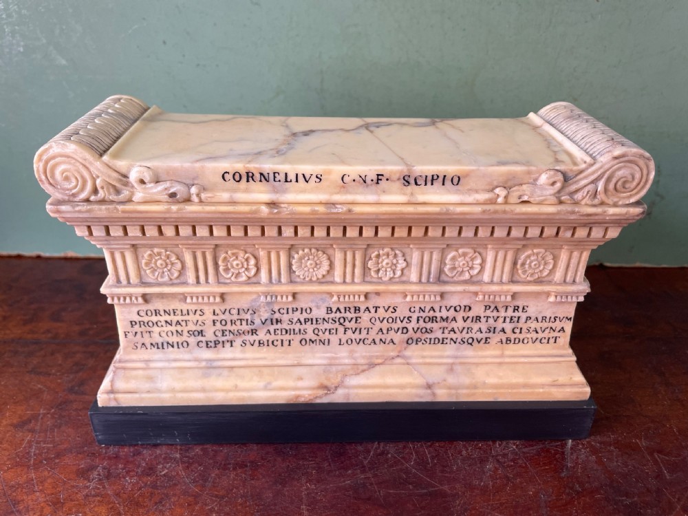 Fine early C19th Italian ‘Grand Tour’ souvenir carved giallo antico marble reduction of the sarcophagus of Lucius Cornelius Scipio Barbatus.
