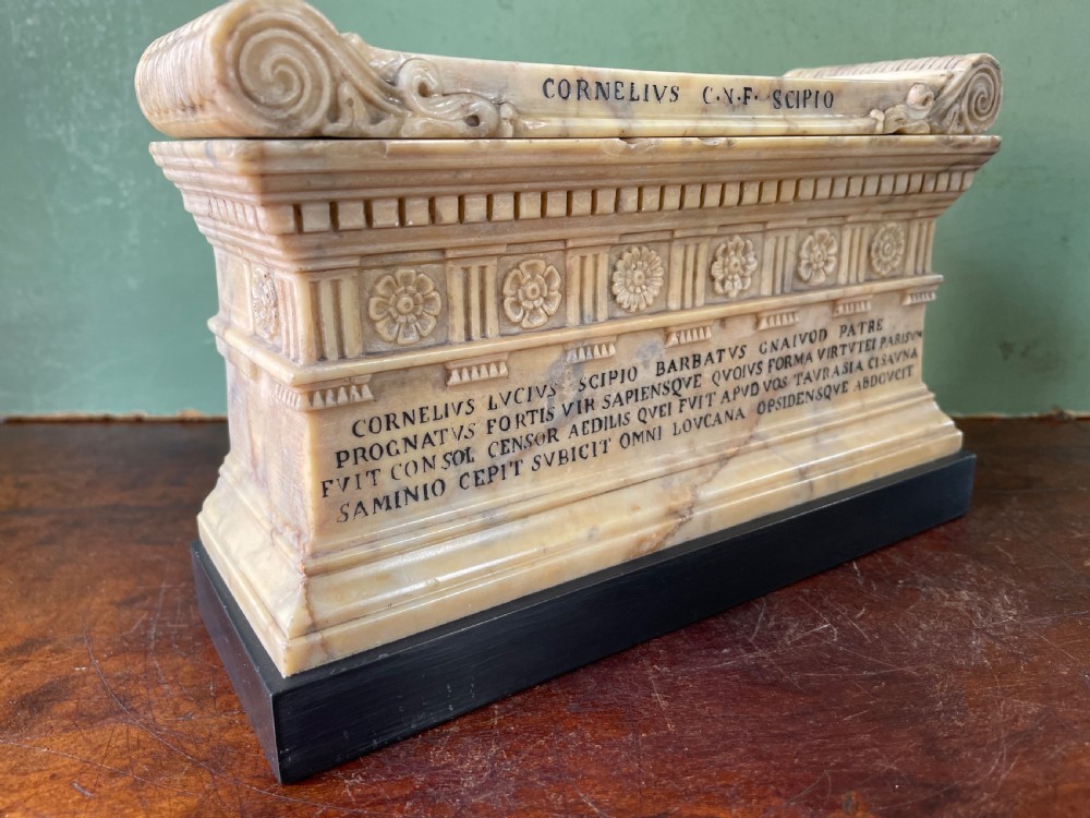 Fine early C19th Italian ‘Grand Tour’ souvenir carved giallo antico marble reduction of the sarcophagus of Lucius Cornelius Scipio Barbatus. View III