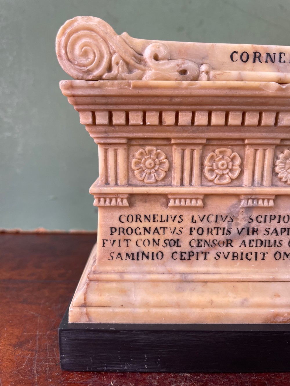 Fine early C19th Italian ‘Grand Tour’ souvenir carved giallo antico marble reduction of the sarcophagus of Lucius Cornelius Scipio Barbatus. View IV