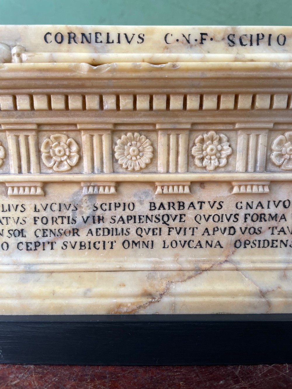Fine early C19th Italian ‘Grand Tour’ souvenir carved giallo antico marble reduction of the sarcophagus of Lucius Cornelius Scipio Barbatus. View V