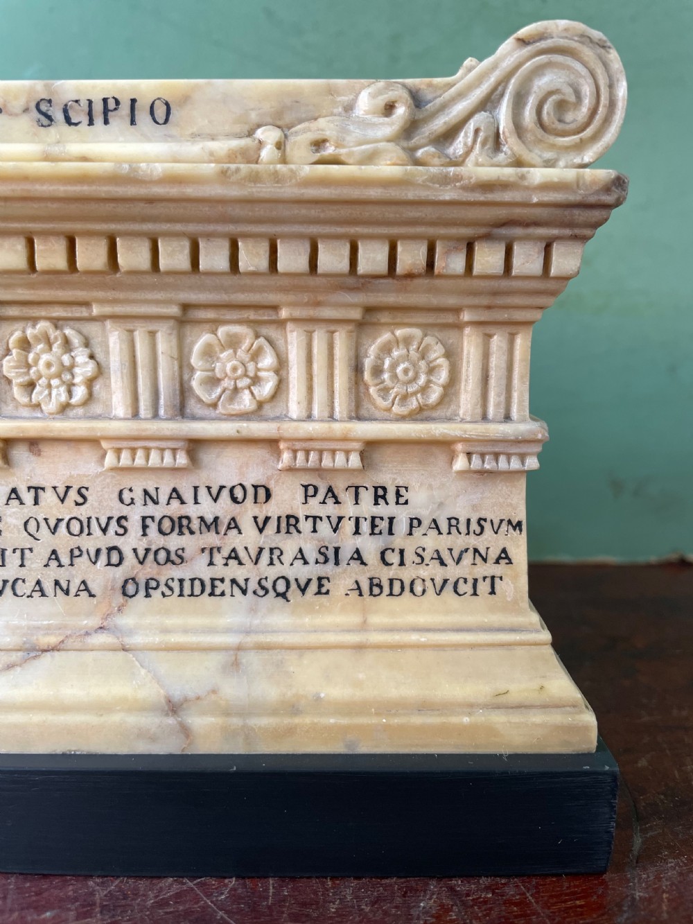 Fine early C19th Italian ‘Grand Tour’ souvenir carved giallo antico marble reduction of the sarcophagus of Lucius Cornelius Scipio Barbatus. View VI