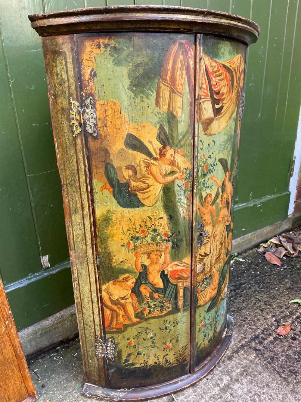 Late C18th Dutch polychrome paint decorated hanging bow-front corner cupboard . View III