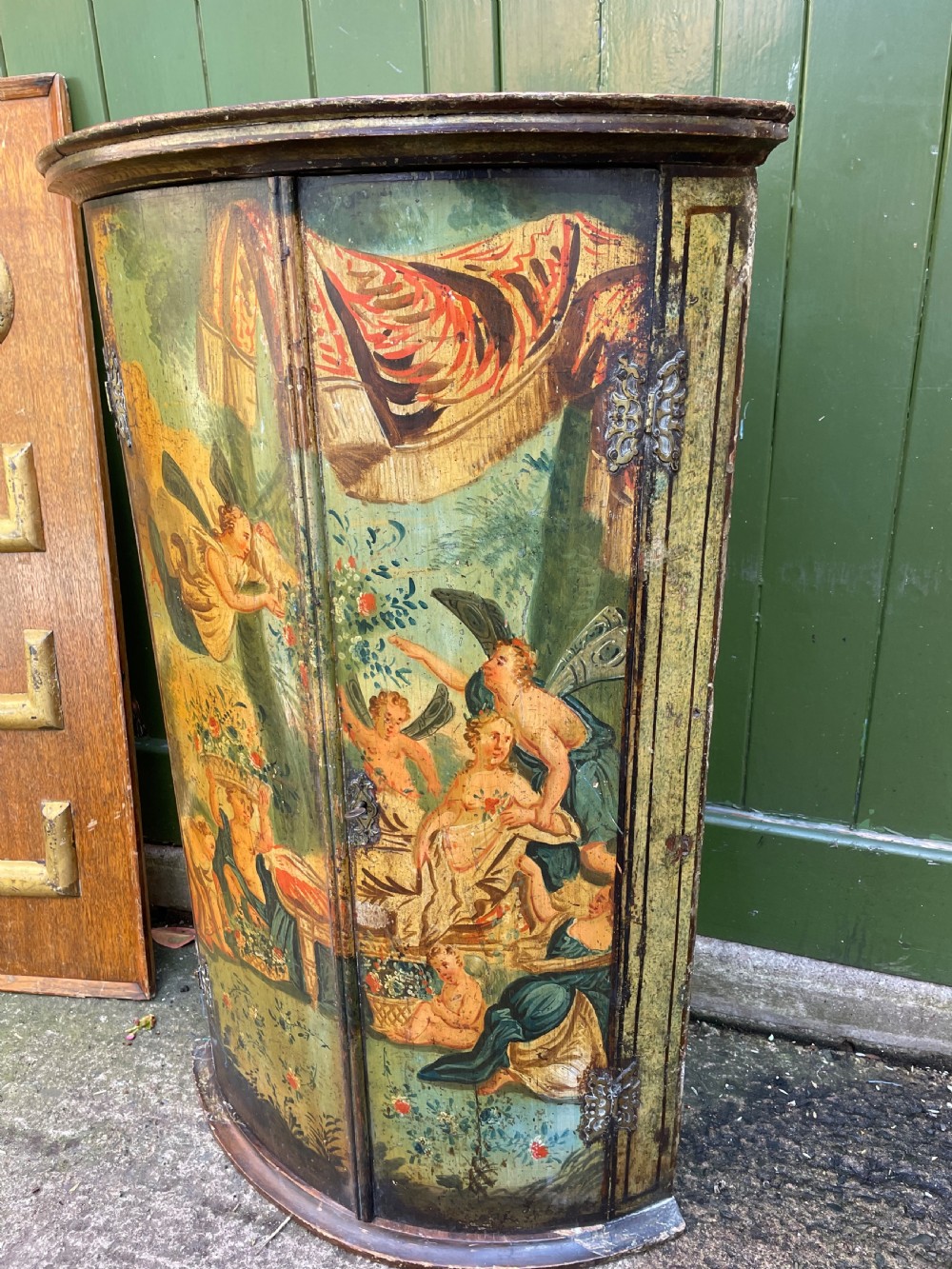 Late C18th Dutch polychrome paint decorated hanging bow-front corner cupboard . View IV
