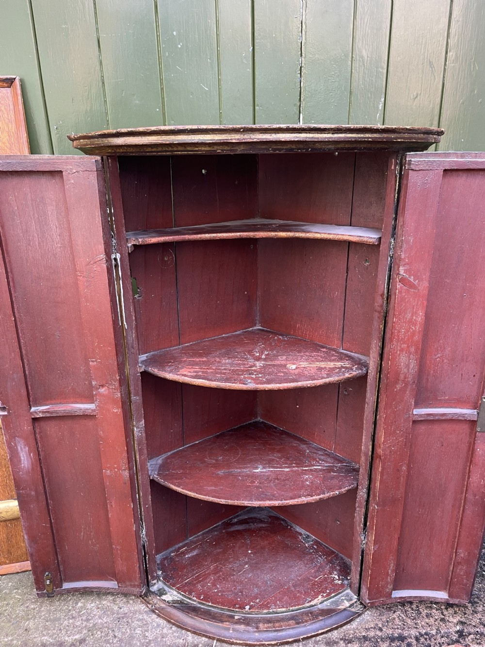 Late C18th Dutch polychrome paint decorated hanging bow-front corner cupboard . View VII