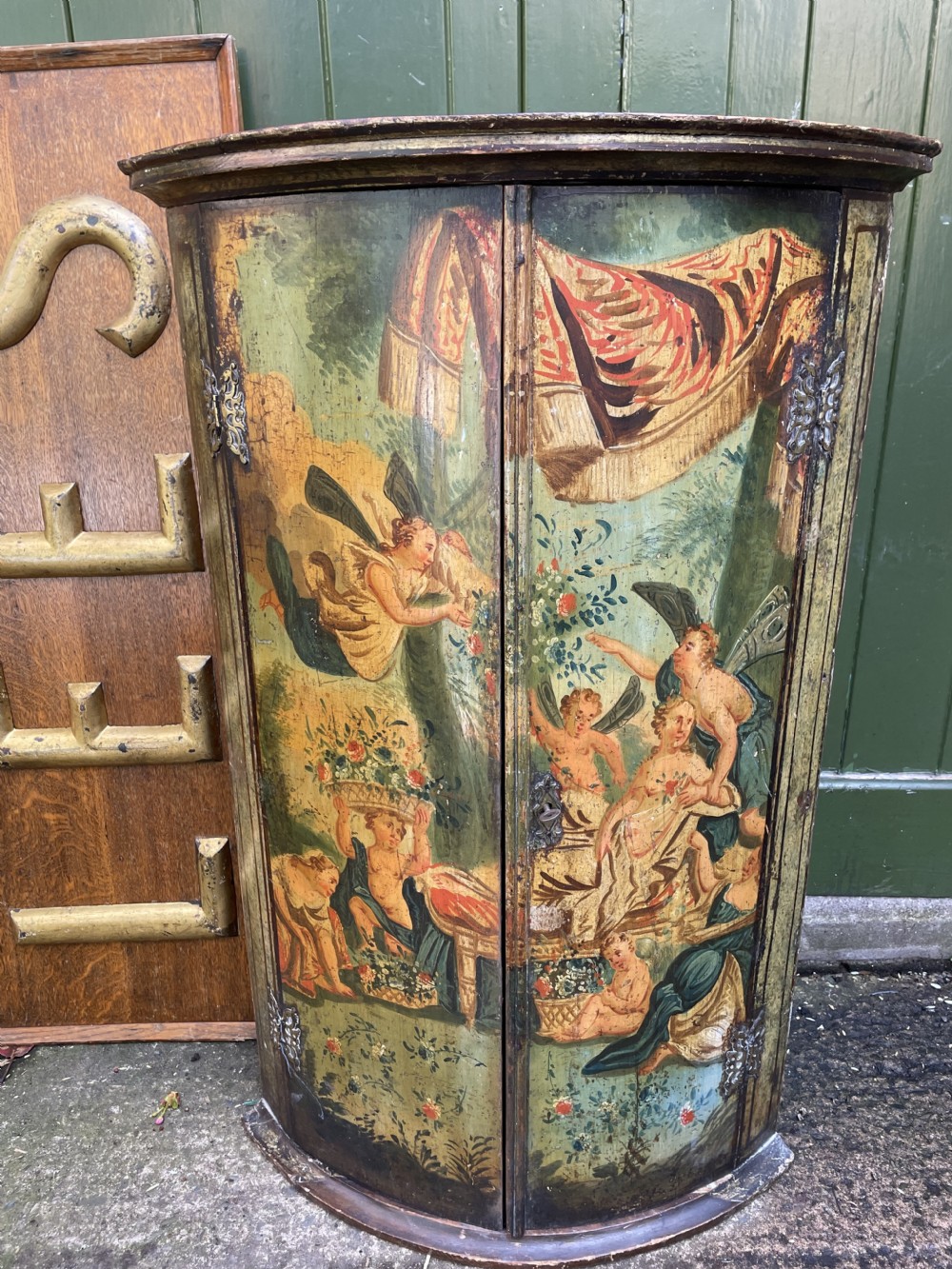 Late C18th Dutch polychrome paint decorated hanging bow-front corner cupboard . View VIII