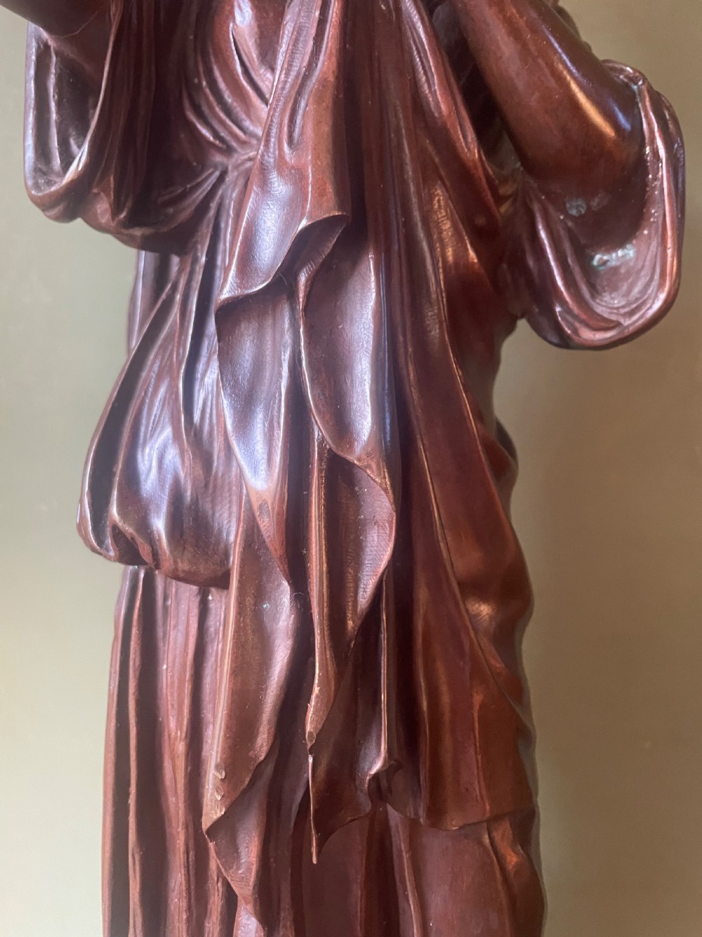 A 19th-century dark bronze sculpture depicting the classical figure of Diane de Gabii adjusting her draped robe. View IX