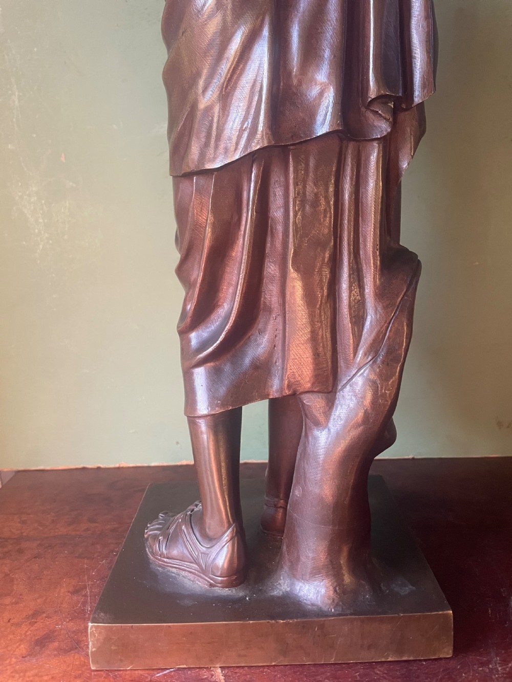 A 19th-century dark bronze sculpture depicting the classical figure of Diane de Gabii adjusting her draped robe. View XV