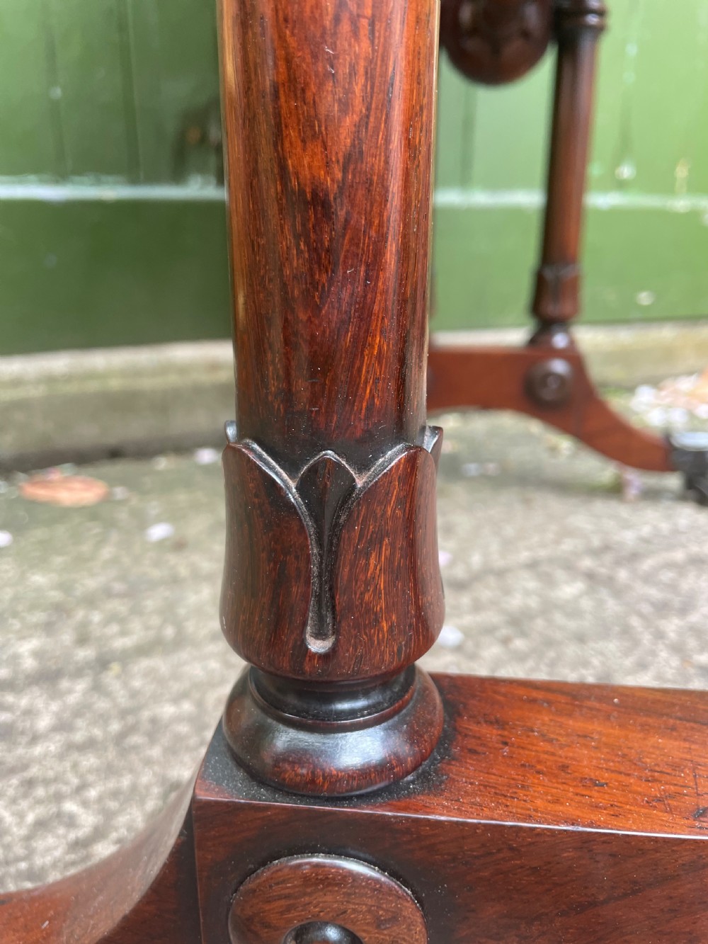 An early 19th-century George IV figured rosewood work table featuring a smooth polished top, single drawer, fabric work basket, turned twin-column supports, and brass castors. View XXIII