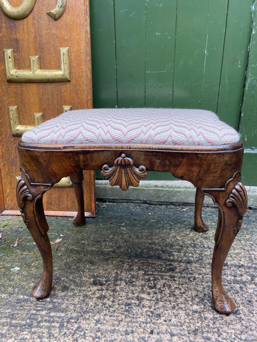 Early C20th Queen Anne period revival carved walnut stool on cabriole legs .