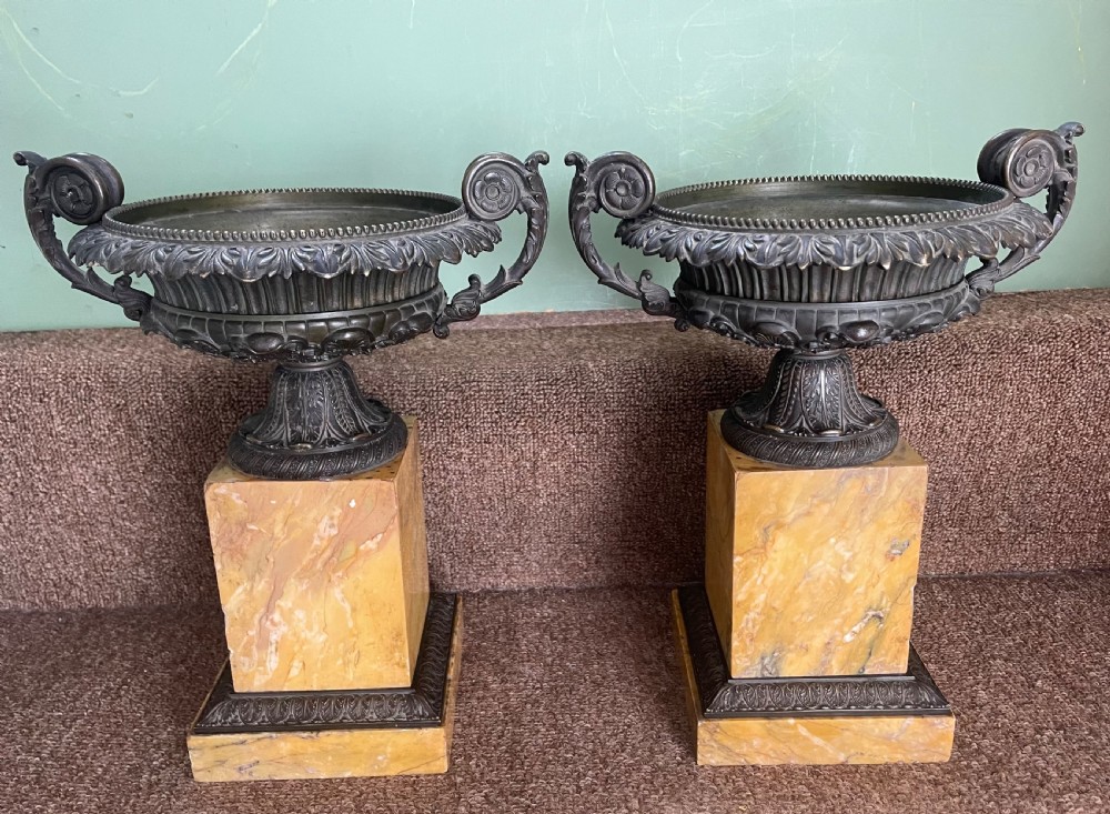 Larger scale pair of early C19th French Charles X period bronze tazzas on siena marble plinth bases .