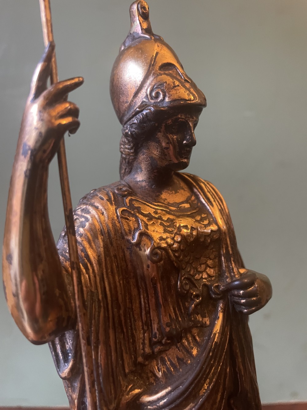 A nineteenth-century gilded bronze sculpture depicting the classical goddess Athena holding a spear, standing on a dark marble base. View XXIV