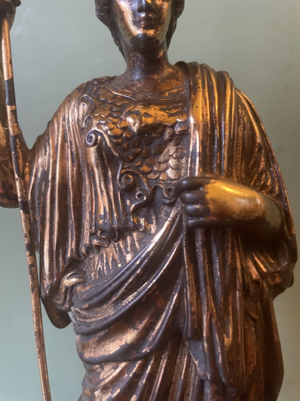 A nineteenth-century gilded bronze sculpture depicting the classical goddess Athena holding a spear, standing on a dark marble base. View XXV