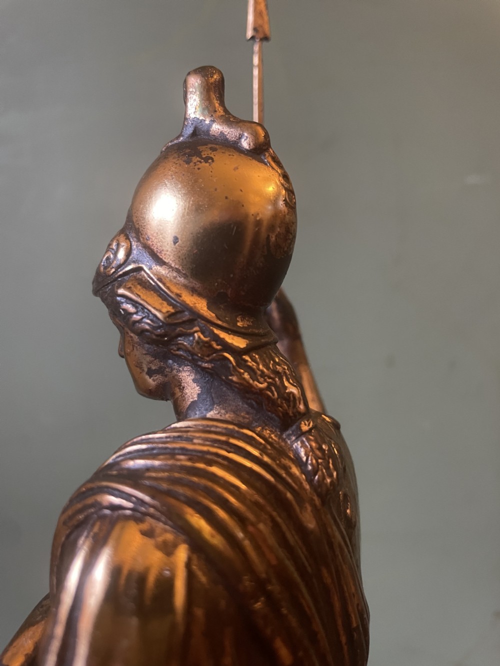 A nineteenth-century gilded bronze sculpture depicting the classical goddess Athena holding a spear, standing on a dark marble base. View XXIX