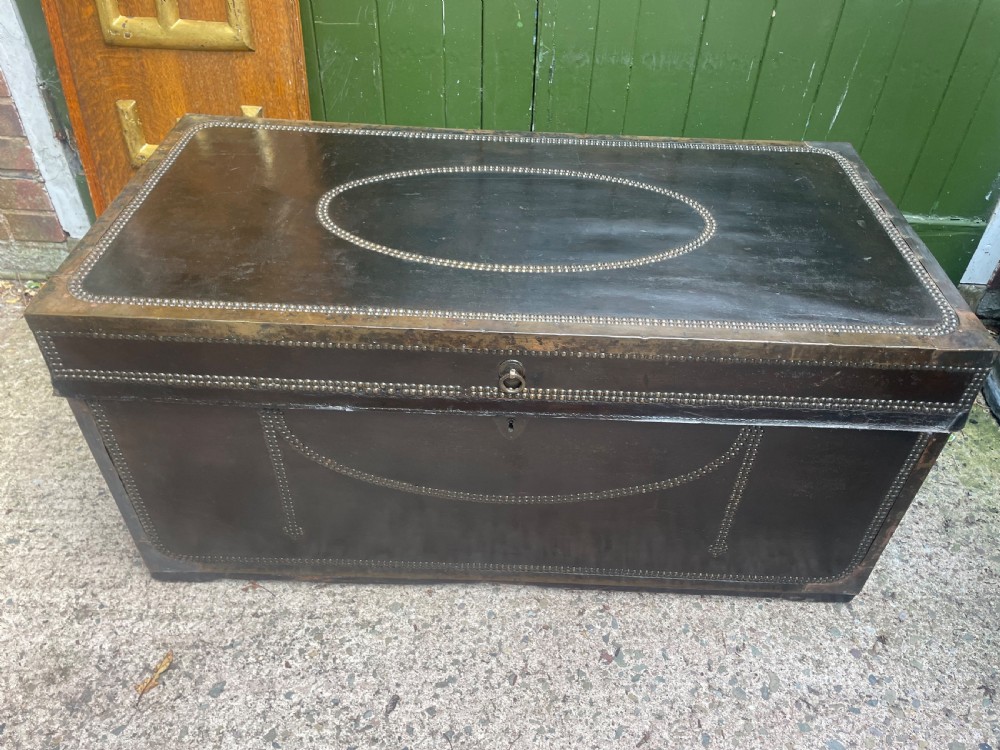 Large scale early C19th Chinese export leather and brass-bound signed camphor trunk . 
 View II