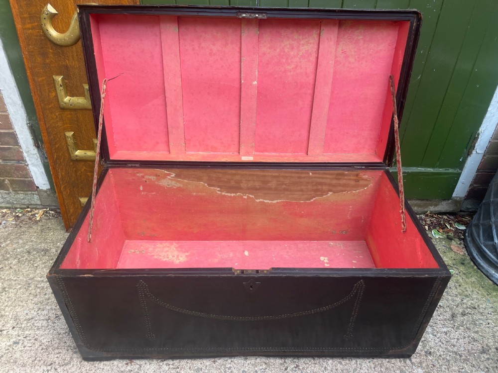 Large scale early C19th Chinese export leather and brass-bound signed camphor trunk . 
 View VII