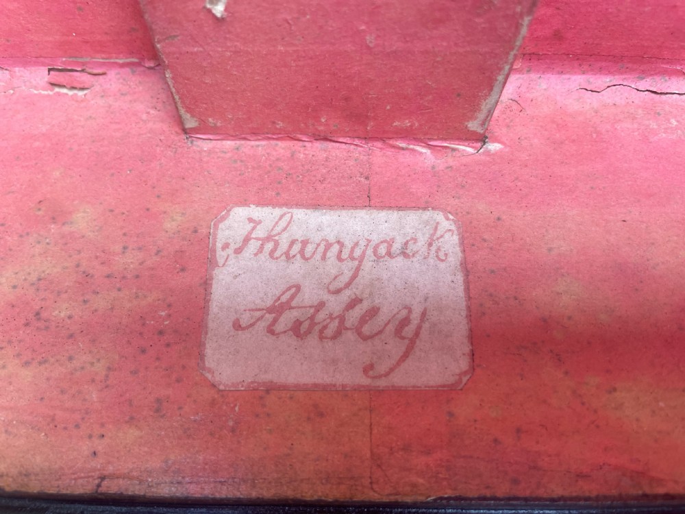 Large scale early C19th Chinese export leather and brass-bound signed camphor trunk . 
 View VIII