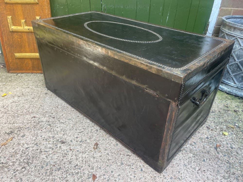Large scale early C19th Chinese export leather and brass-bound signed camphor trunk . 
 View XI