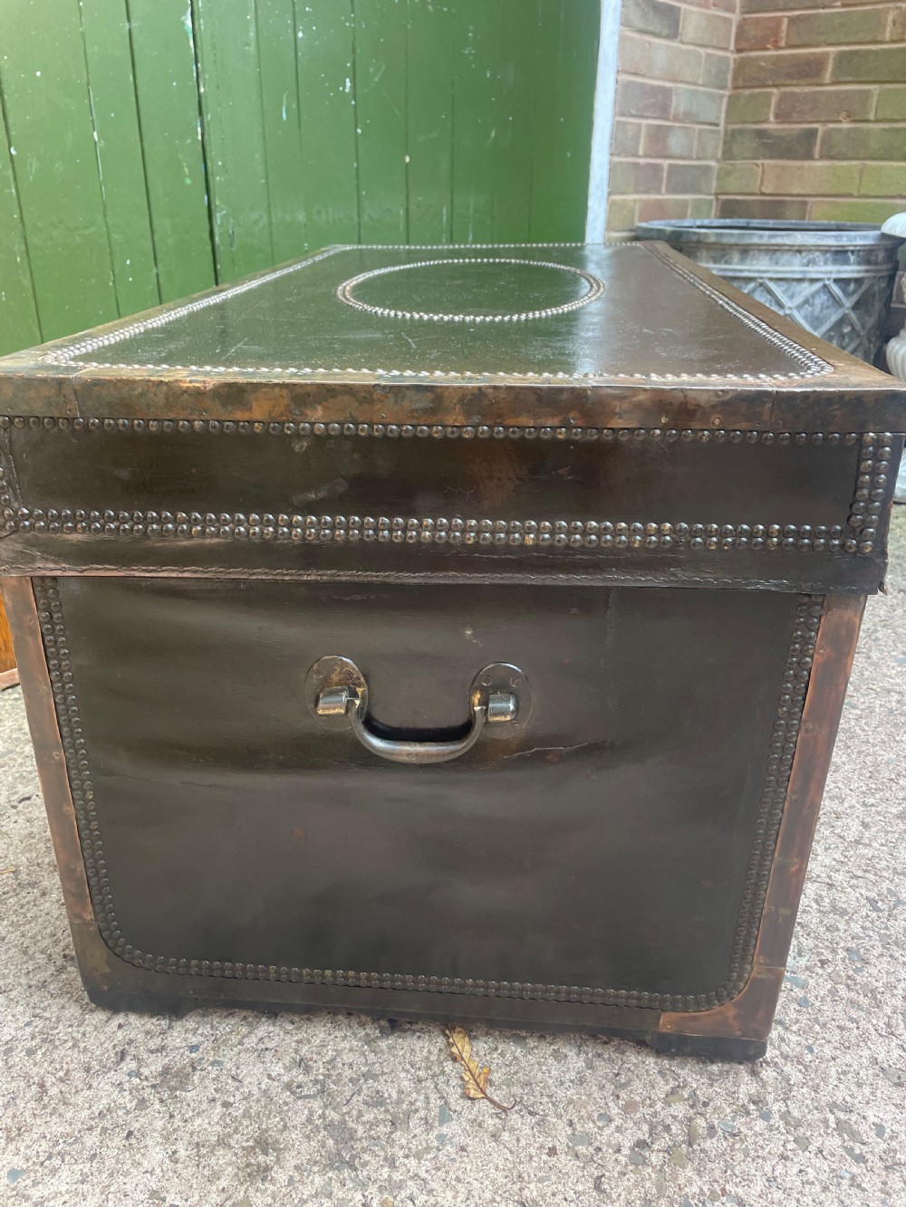 Large scale early C19th Chinese export leather and brass-bound signed camphor trunk . 
 View XII