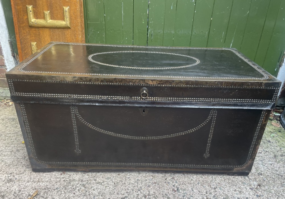 Large scale early C19th Chinese export leather and brass-bound signed camphor trunk . 
