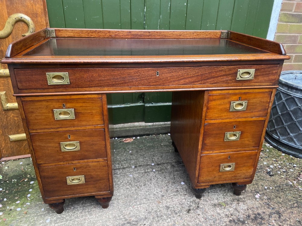 C19th mahogany naval or military campaign pedestal desk .