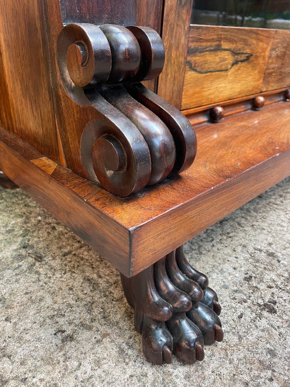 Early C19th George IV period carved rosewood glazed bookcase or pier cabinet of bold design .  View VII