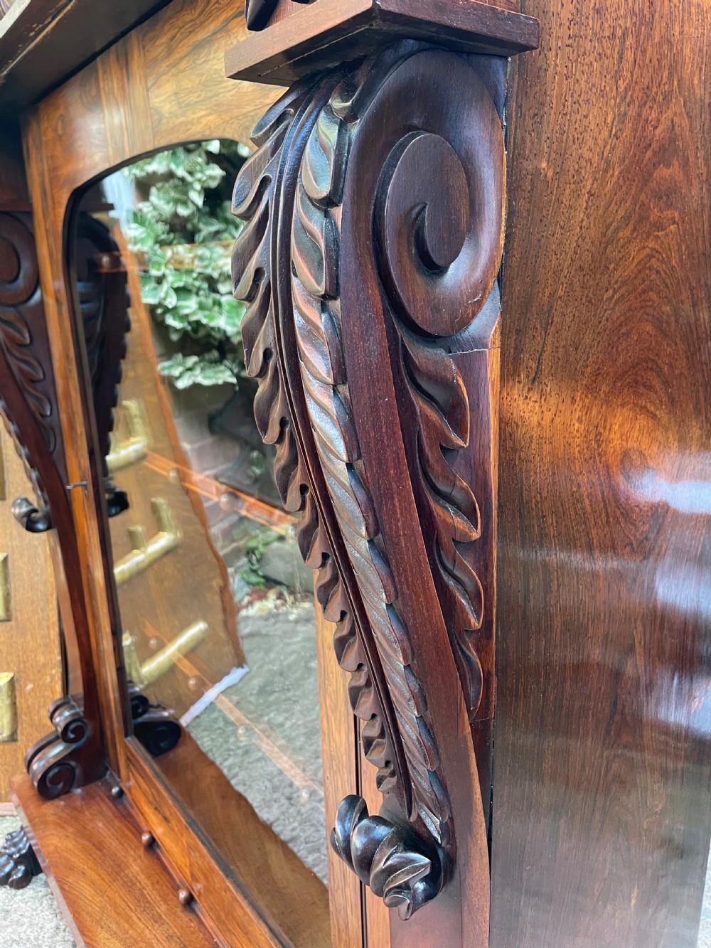 Early C19th George IV period carved rosewood glazed bookcase or pier cabinet of bold design .  View XV