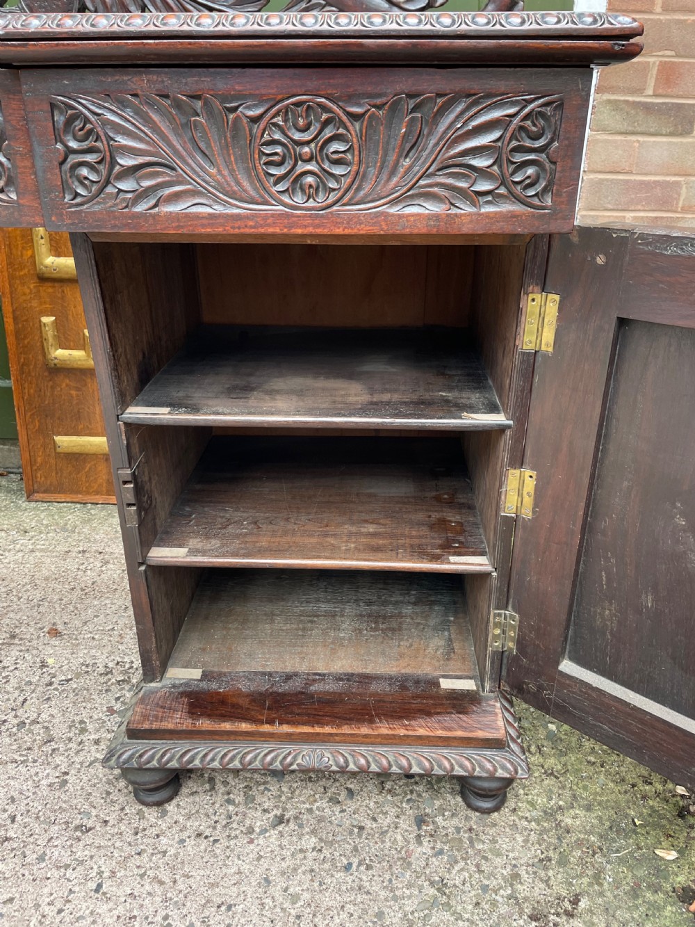 C19th Anglo-Indian carved padauk pedestal sideboard. View VII