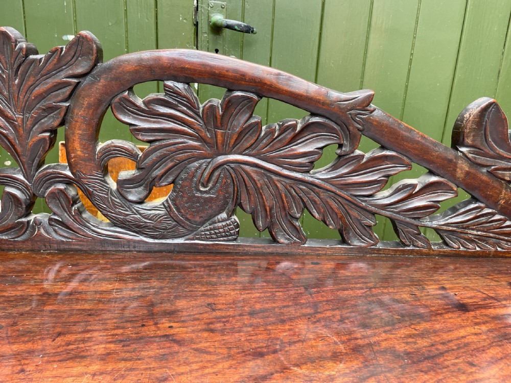 C19th Anglo-Indian carved padauk pedestal sideboard. View XII