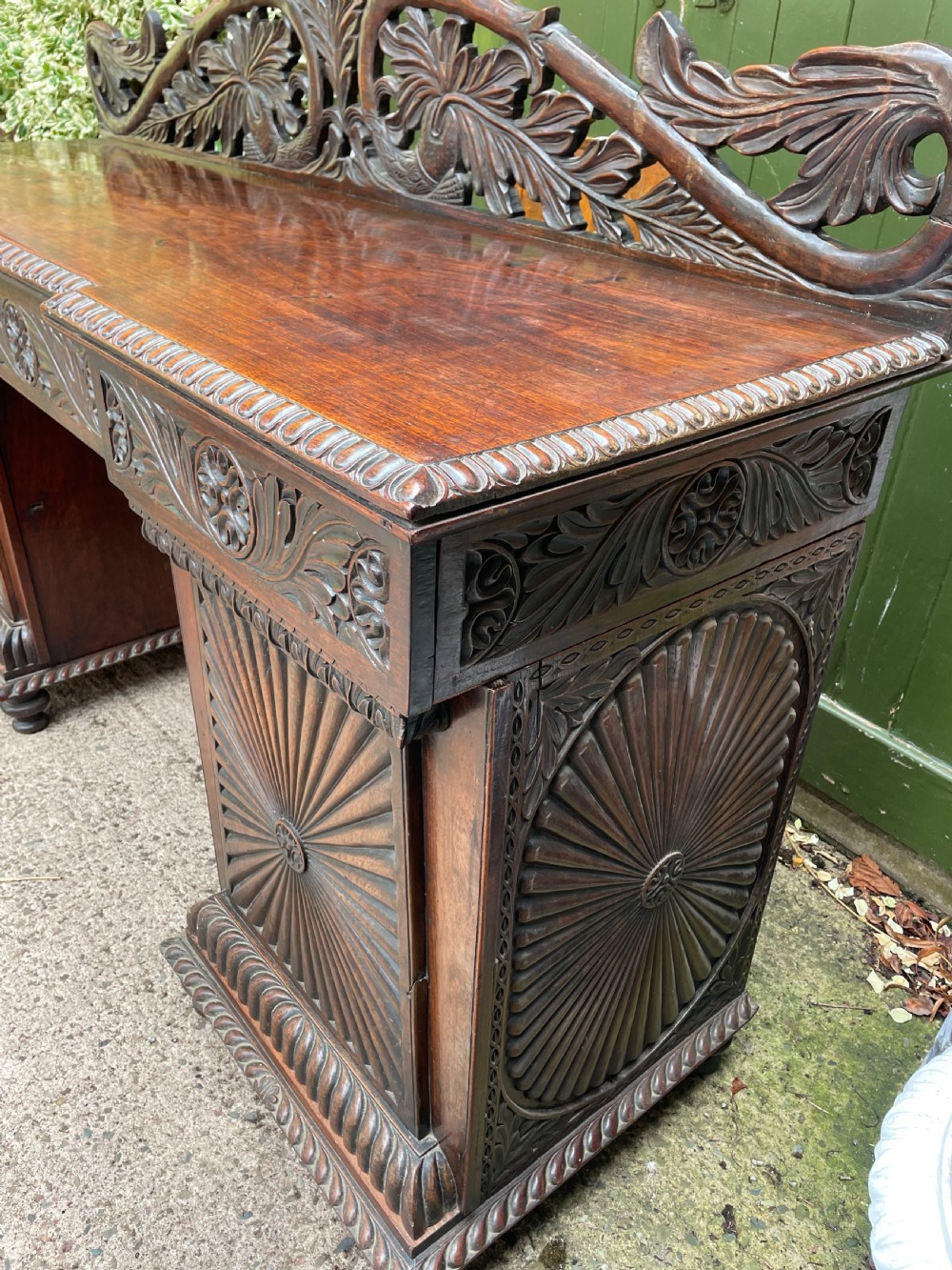 C19th Anglo-Indian carved padauk pedestal sideboard. View XVII