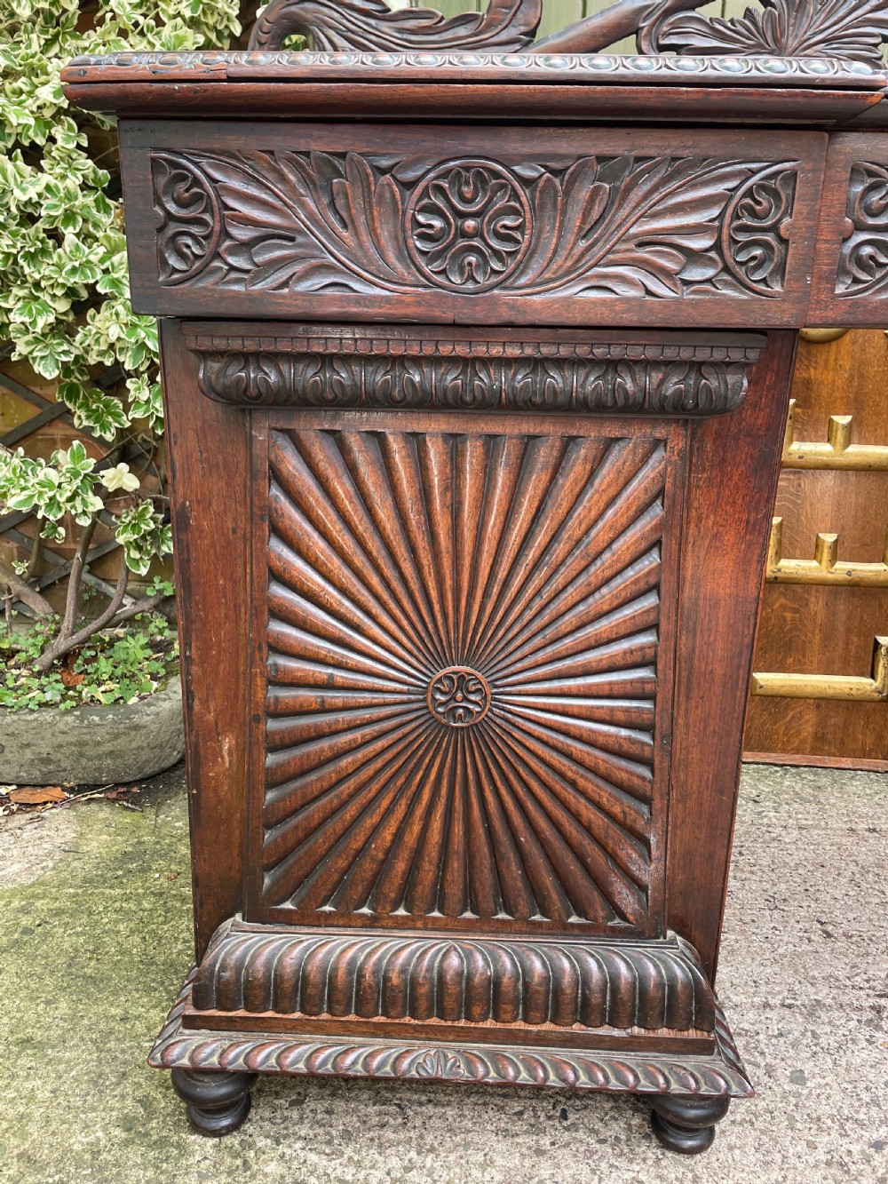 C19th Anglo-Indian carved padauk pedestal sideboard. View XIX