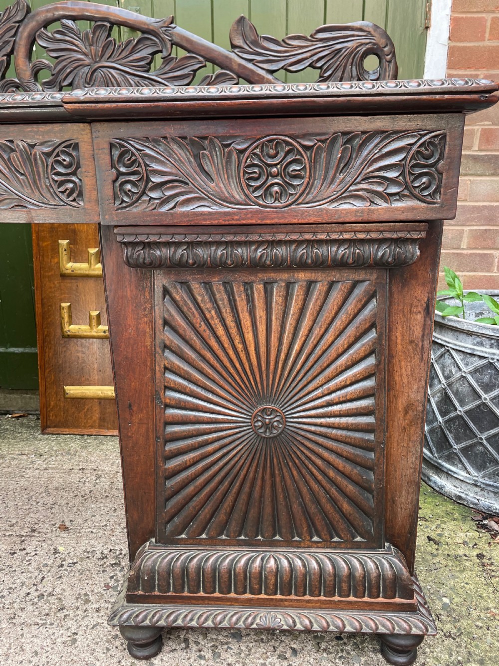 C19th Anglo-Indian carved padauk pedestal sideboard. View XX