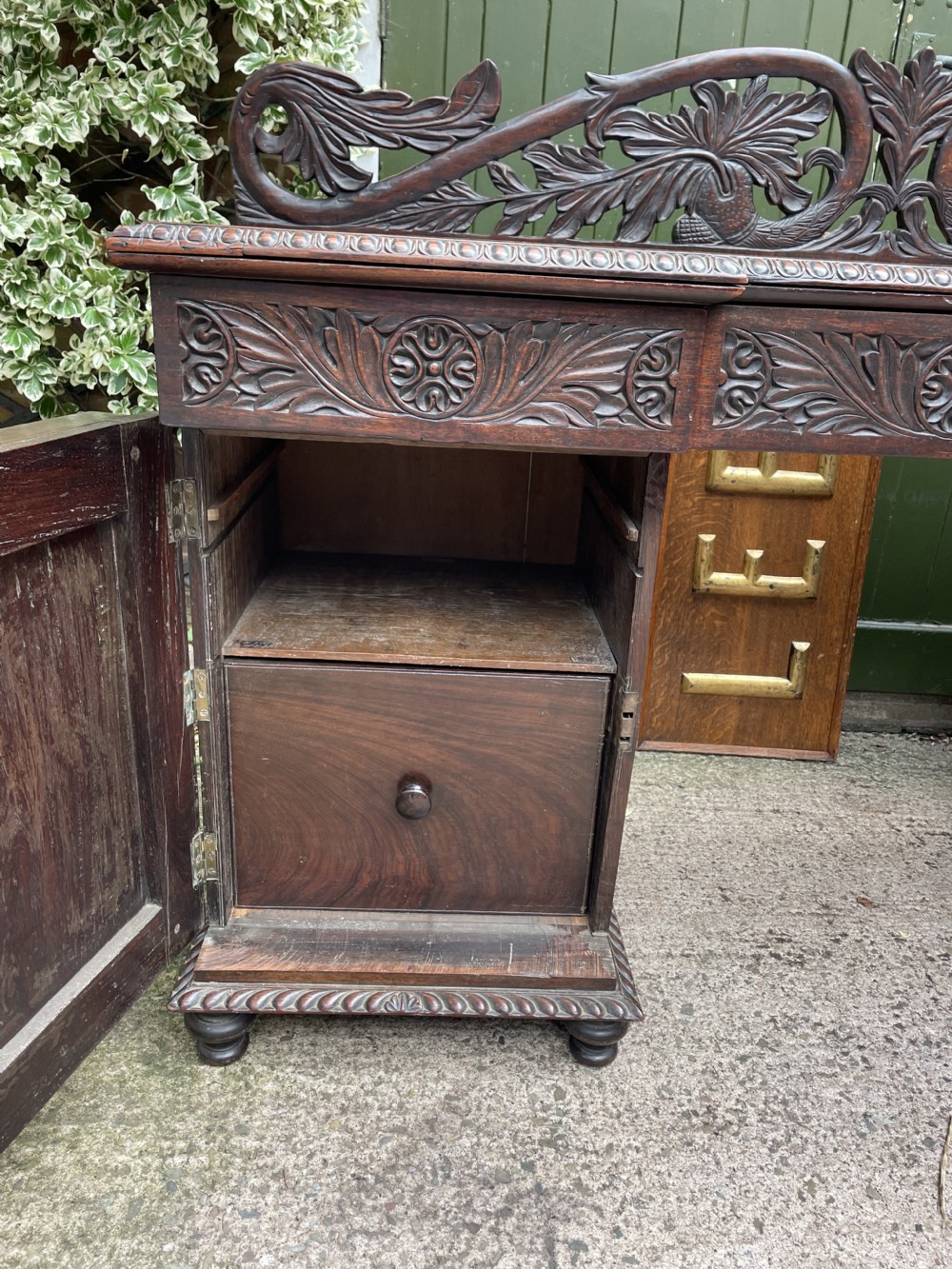 C19th Anglo-Indian carved padauk pedestal sideboard. View XXV