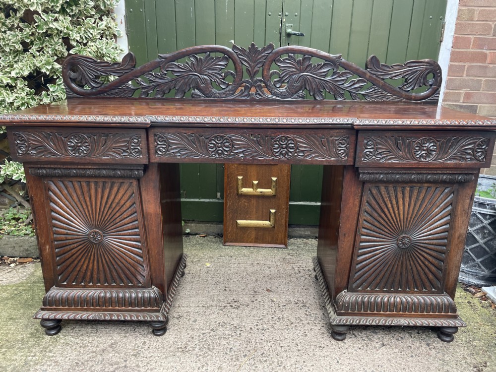 C19th Anglo-Indian carved padauk pedestal sideboard. View XXVI