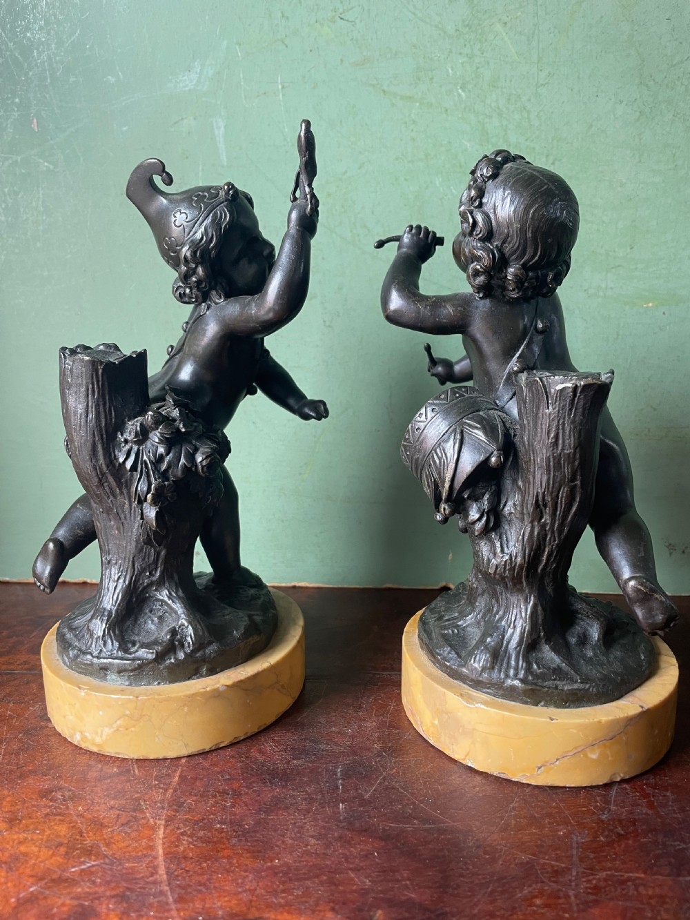 Pair of early C19th French bronze allegorical sculptures of cherubs , emblematic of music and comedy after Clodion.
 View II
