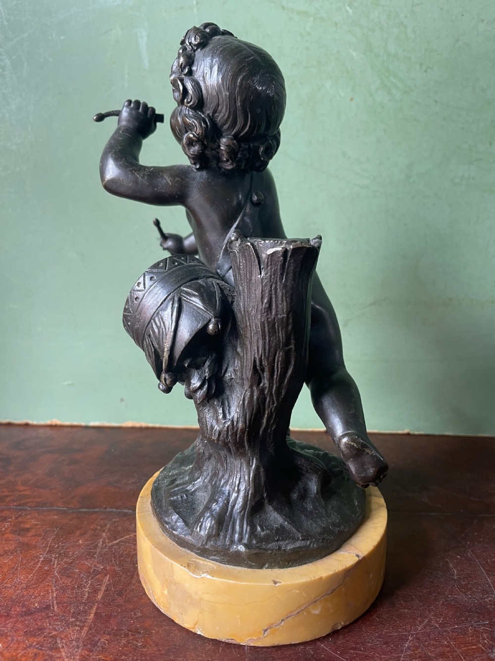 Pair of early C19th French bronze allegorical sculptures of cherubs , emblematic of music and comedy after Clodion.
 View X