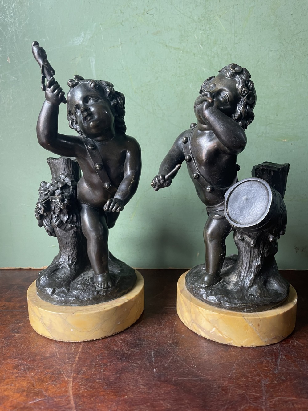 Pair of early C19th French bronze allegorical sculptures of cherubs , emblematic of music and comedy after Clodion.
 View XVIII
