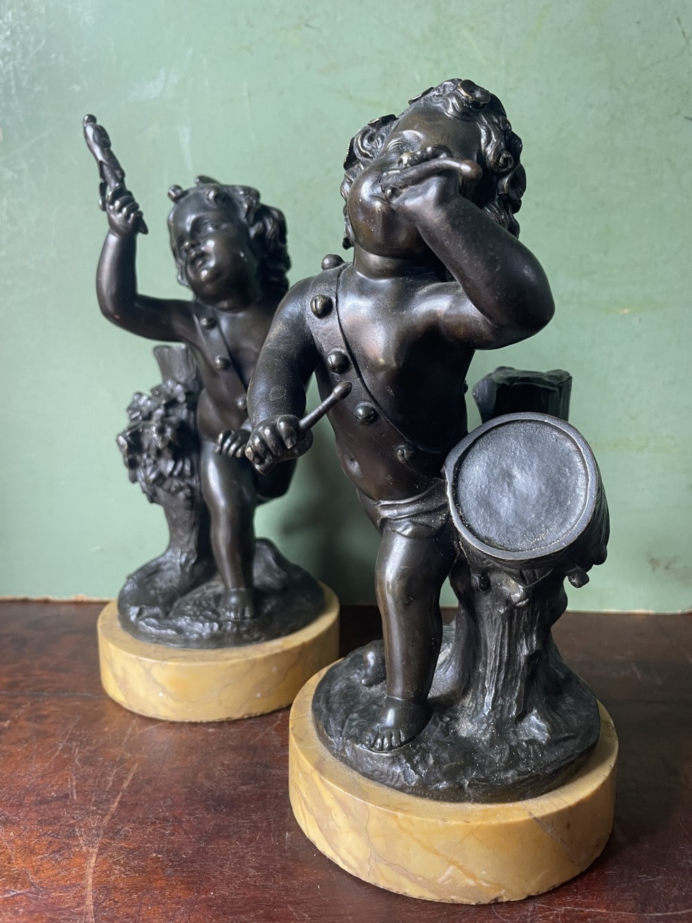 Pair of early C19th French bronze allegorical sculptures of cherubs , emblematic of music and comedy after Clodion.
 View XX