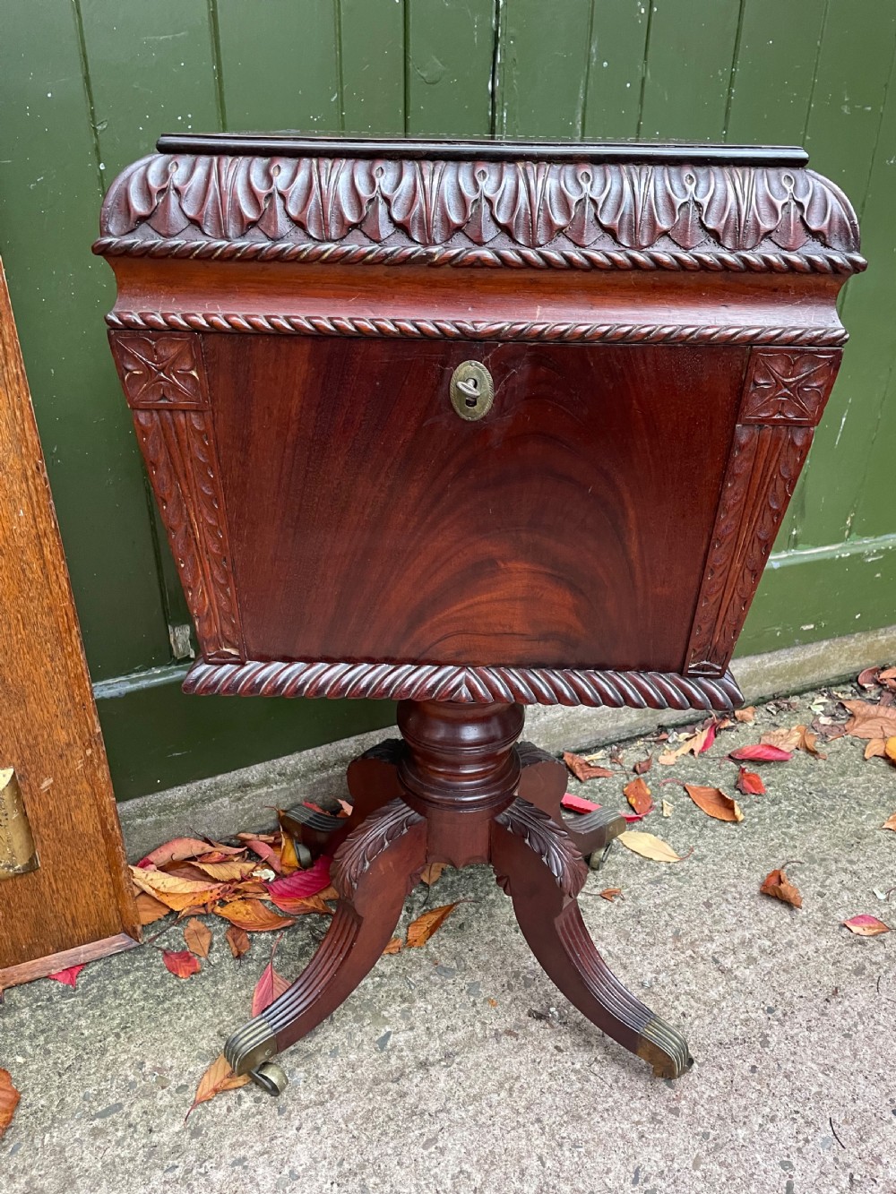 Early C19th Regency period Irish carved mahogany cellarette. View II
