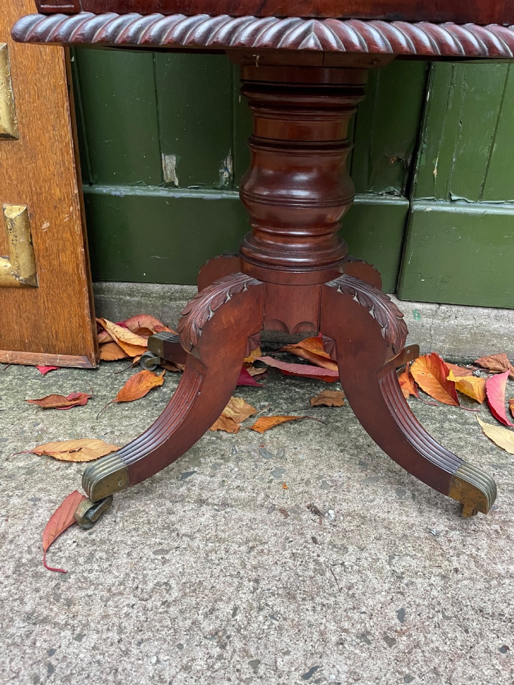 Early C19th Regency period Irish carved mahogany cellarette. View X