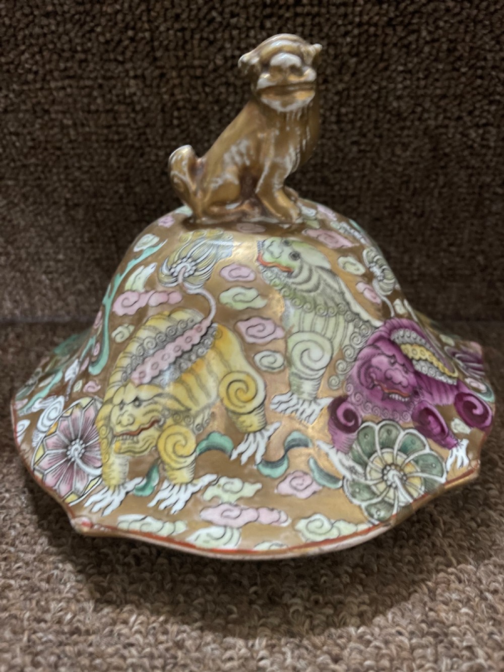 A three-piece nineteenth-century Masons Ironstone garniture set decorated with Chinoiserie enamel patterns, blue handles, and lion lid finials. View X