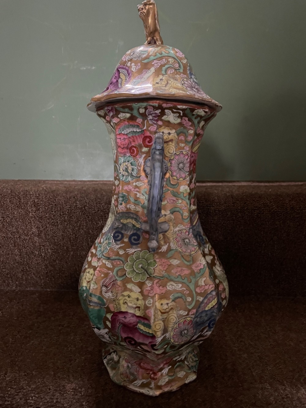 A three-piece nineteenth-century Masons Ironstone garniture set decorated with Chinoiserie enamel patterns, blue handles, and lion lid finials. View XXV