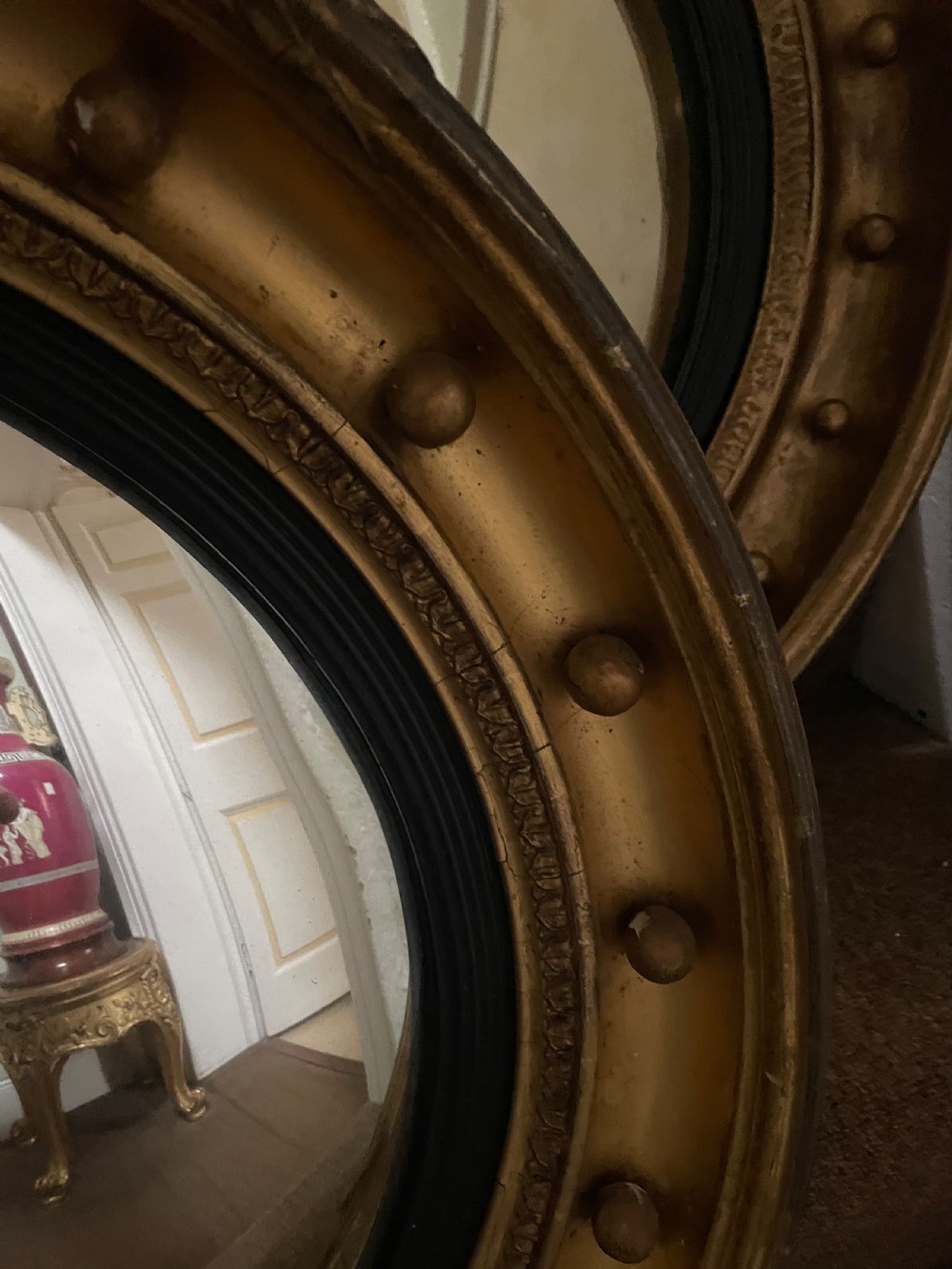 Matched pair of early C19th Regency period circular gilt-wood framed convex-plate mirrors  View VI