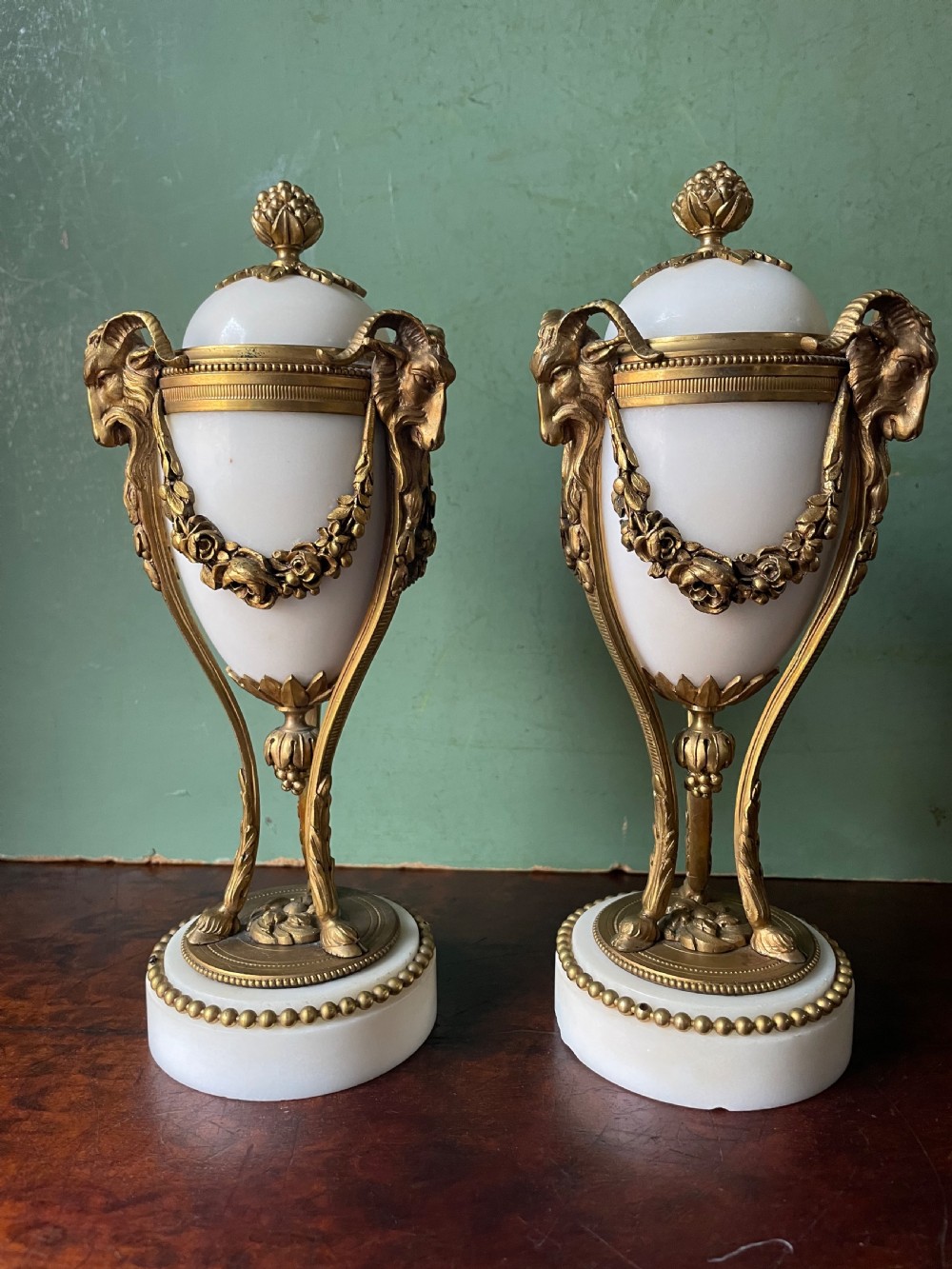 Pair of late C19th French Louis XVI period style ormolu-mounted marble cassolettes.