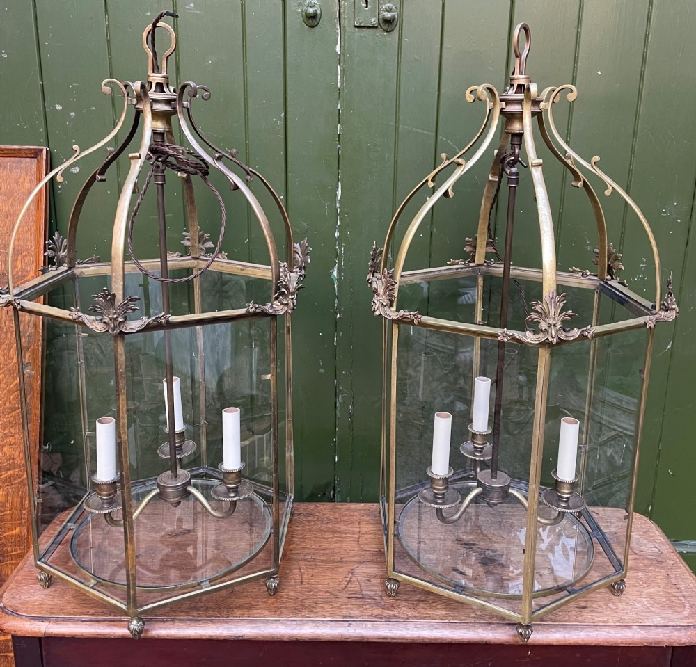 Pair of early C20th brass-framed hexagonal hall lanterns of late C18th George III period design. View II