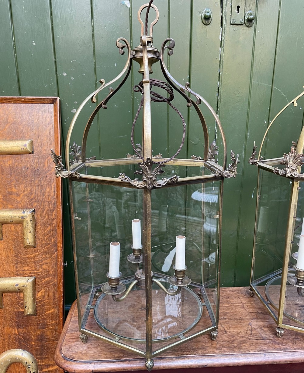 Pair of early C20th brass-framed hexagonal hall lanterns of late C18th George III period design. View IV