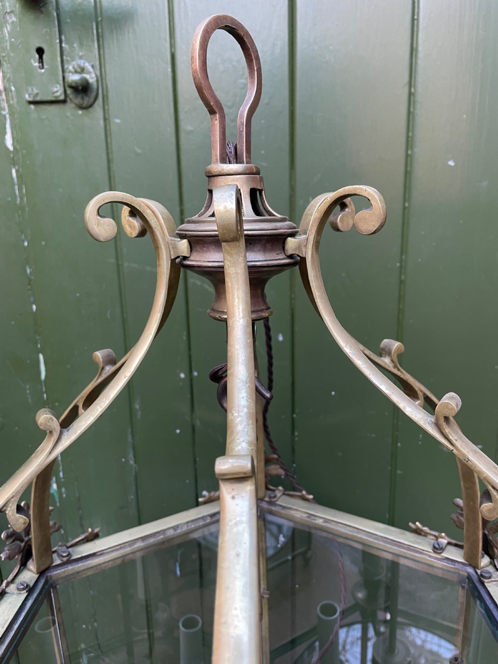 Pair of early C20th brass-framed hexagonal hall lanterns of late C18th George III period design. View VI