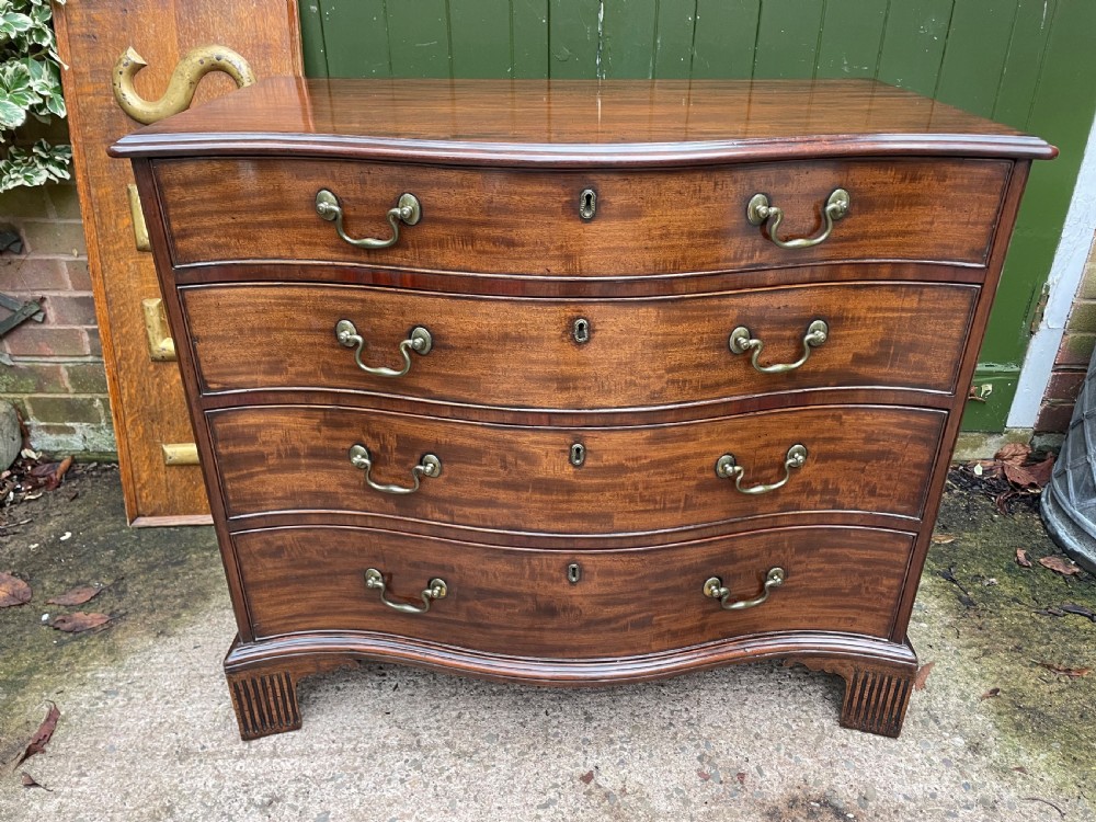 Fine C18th George III Chippendale period mahogany serpentine-front chest of drawers.  View V