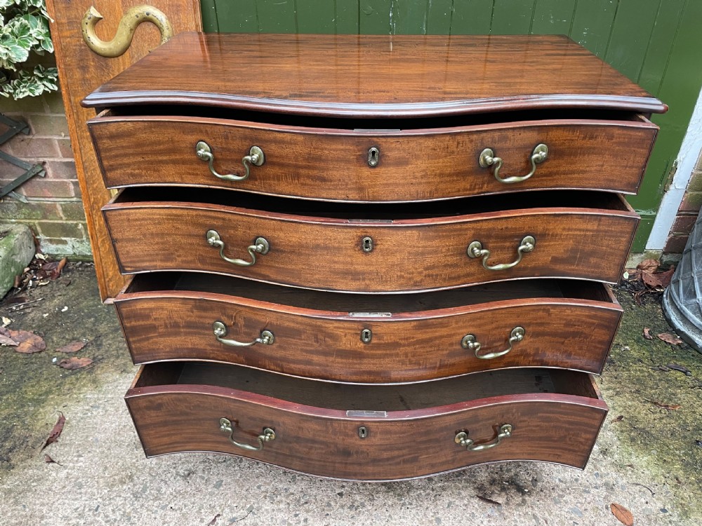 Fine C18th George III Chippendale period mahogany serpentine-front chest of drawers.  View VII