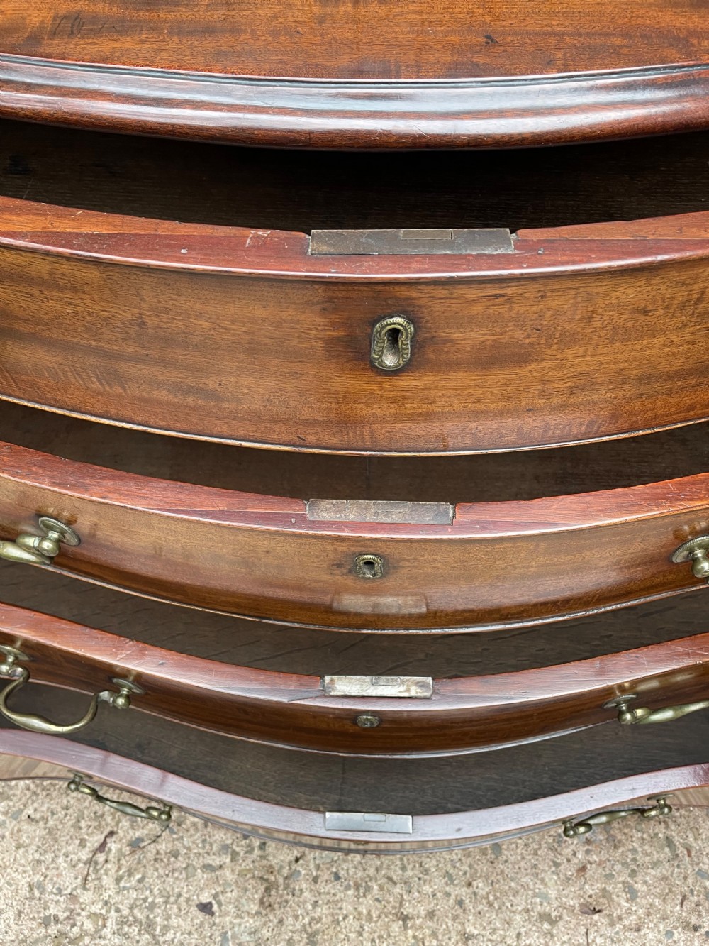 Fine C18th George III Chippendale period mahogany serpentine-front chest of drawers.  View VIII